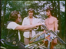 The guys meet the homo biker.
