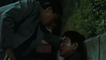 Iguchi gives Otomo a talking to.